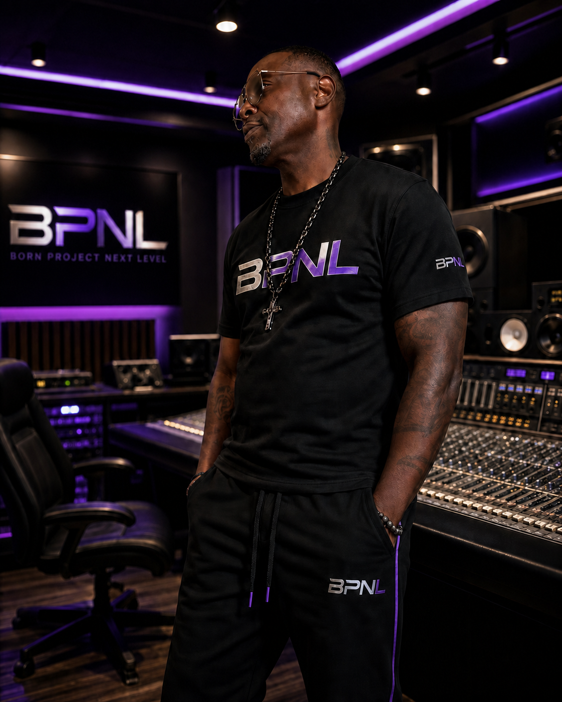 BPNL founder and CEO in the studio wearing the BPNL chrome logo tee
